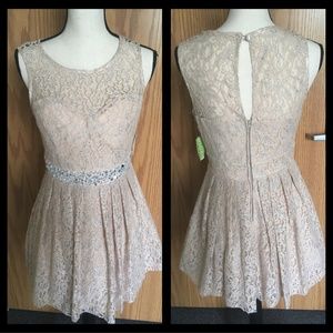 Sparkly champagne dress with rhinestone belt.